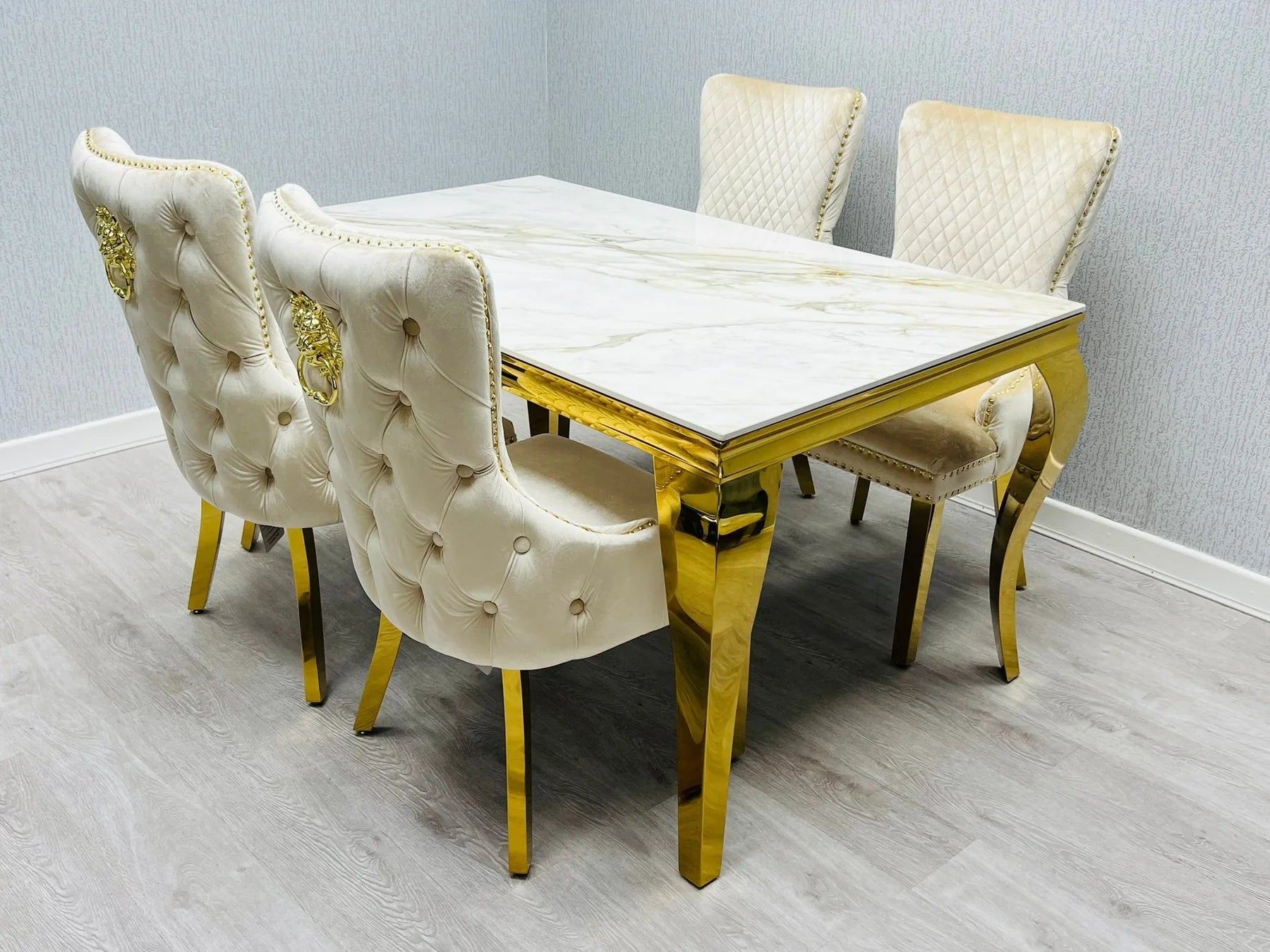 Louis Gold Cream Marble Dining Table With Shimmer Gold Lion Knocker Dining Chairs